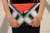 clutch with orange flair